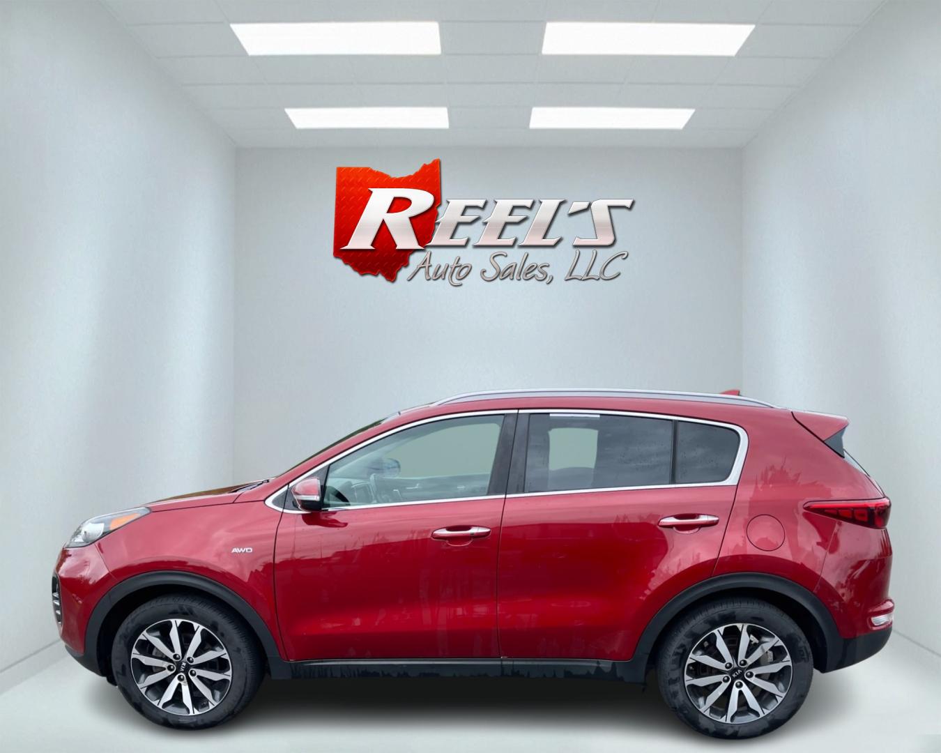 2018 Red /Gray Kia Sportage EX AWD (KNDPNCAC3J7) with an 2.4L I4 DOHC 24V engine, 6A transmission, located at 547 E. Main St., Orwell, OH, 44076, (440) 437-5893, 41.535435, -80.847855 - This 2018 Kia Sportage EX AWD is a well-rounded compact SUV that offers a good blend of capability and features. It comes equipped with a 2.4L I4 GDI engine paired with a 6-speed automatic transmission and AWD system with locking center differential. The driving experience is enhanced by features li - Photo#9